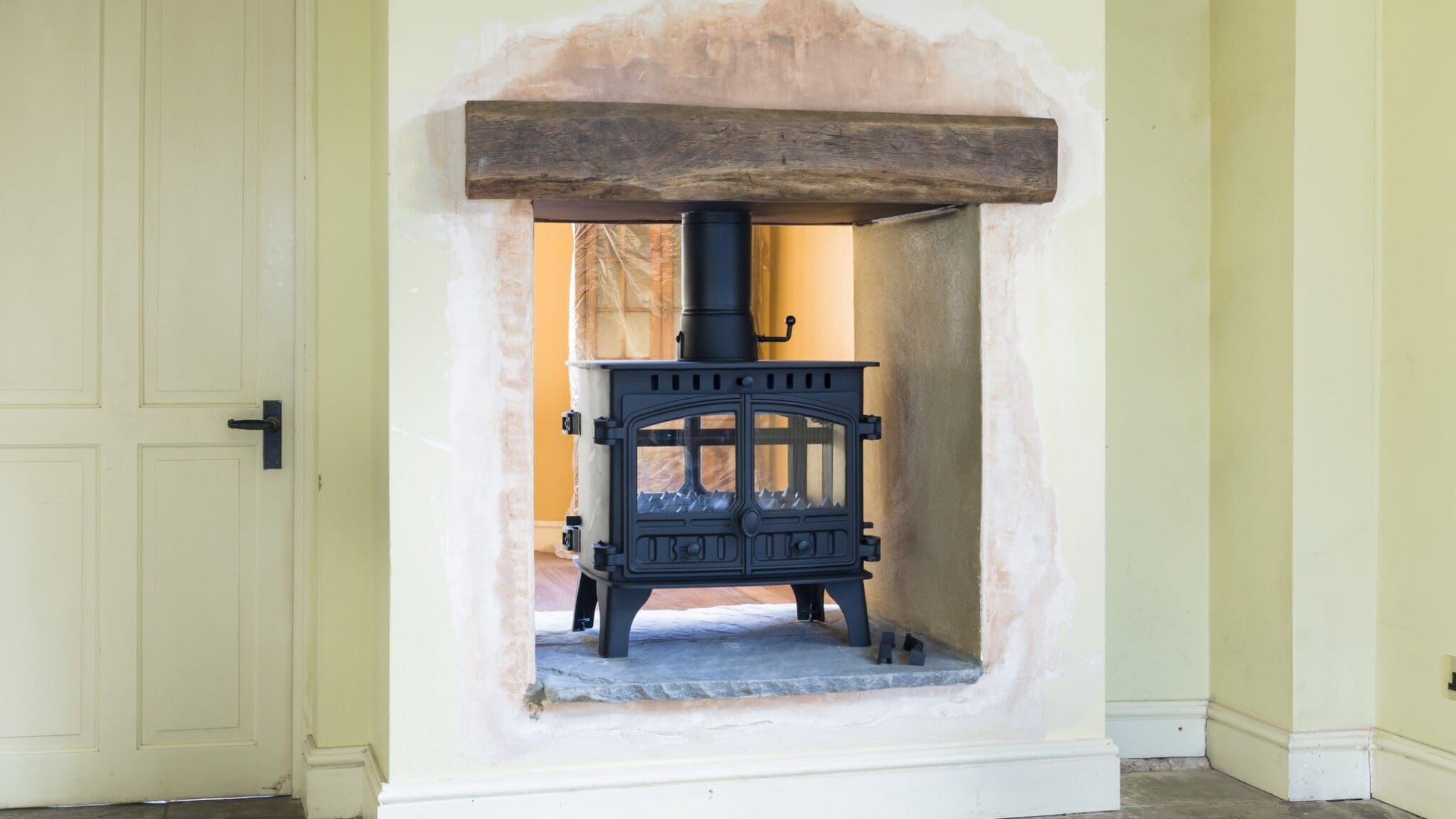 Uninsulated solid fuel flue pipes to combustible material